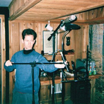 Recording engineer Tommy Skarupa setting up the microphones for a session in the studio in 2004