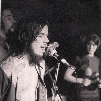 Brian singing with Walt Amey, Julie Aldworth McClenathan, and “Tribe” at a Coffeehouse in 1970