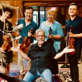 Brian with violin section Kobi Malkin (principal of American ballet Theatre), Suliman Tekalli (principle of Indiana chamber orchestra), Elizabeth Neilsen (principle of Broadway’s Death Becomes Her), and Nikita Yermak (principal of Radio City) recording spiccato parts for symphonies at Carriage House Studios in Stamford, CT July 2025