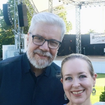 Brian and Levitt Pavilion co director, Carleigh Welsh, at the Levitt Pavilion grounds in September 2025, on the occasion of Brian donating a piano to the Levitt Pavilion in Westport, CT in honor of his brother Geoffrey, who passed in July of 2025, and his mother Winifred, who passed in April 2024.